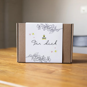 Geschenkbox aus Karton mit frisch geröstetem Bio-Kaffee von CARLES